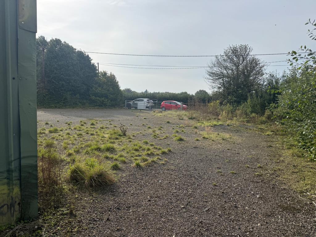 Lot: 112 - DETACHED BARN ON HALF AN ACRE WITH POTENTIAL - View of yard towards the road